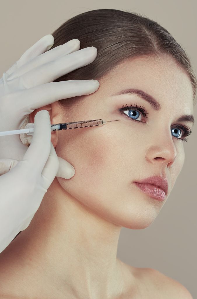 A woman receiving a Botox treatment, a service offered at Lotti Aesthetics and Wellness.